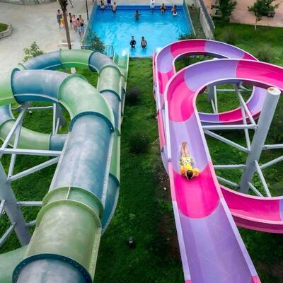 Buon prezzo Doppia spirale piccolo parco acquatico combinato scivolo 5-8m altezza per esterni in linea